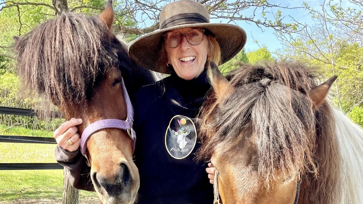 Debbie Nightingale with two horses