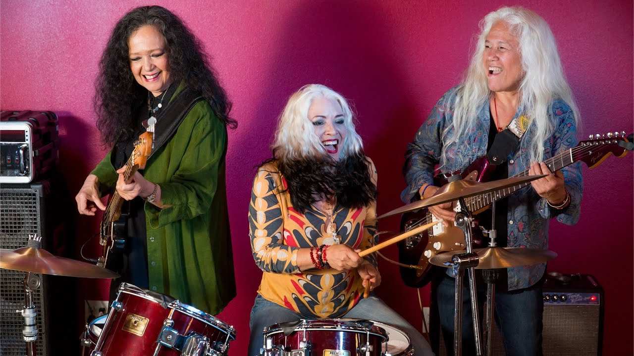 three women playing music