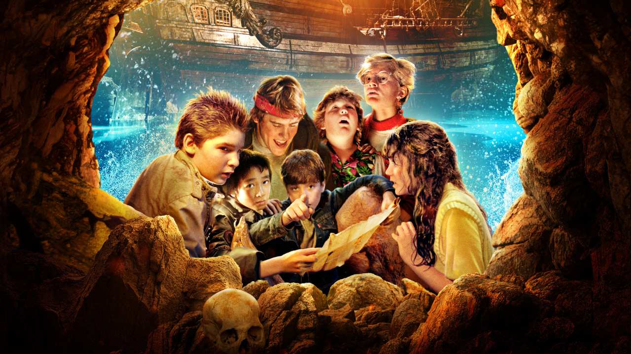a group of kids and teens looking at a treasure map
